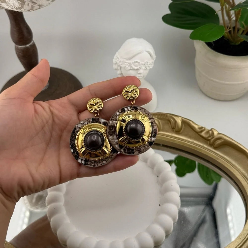 Anthropologie bold #statementearrings consistent